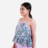 Left View of a Model wearing Blue Floral Block Print Frilled Cotton Camisole Top