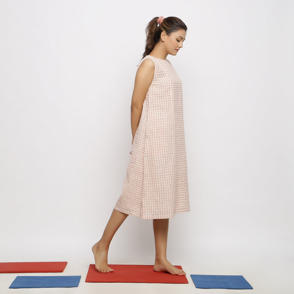 Right View of a Model wearing Vegetable Dyed Pink Paneled Dress