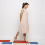 Right View of a Model wearing Vegetable Dyed Pink Paneled Dress