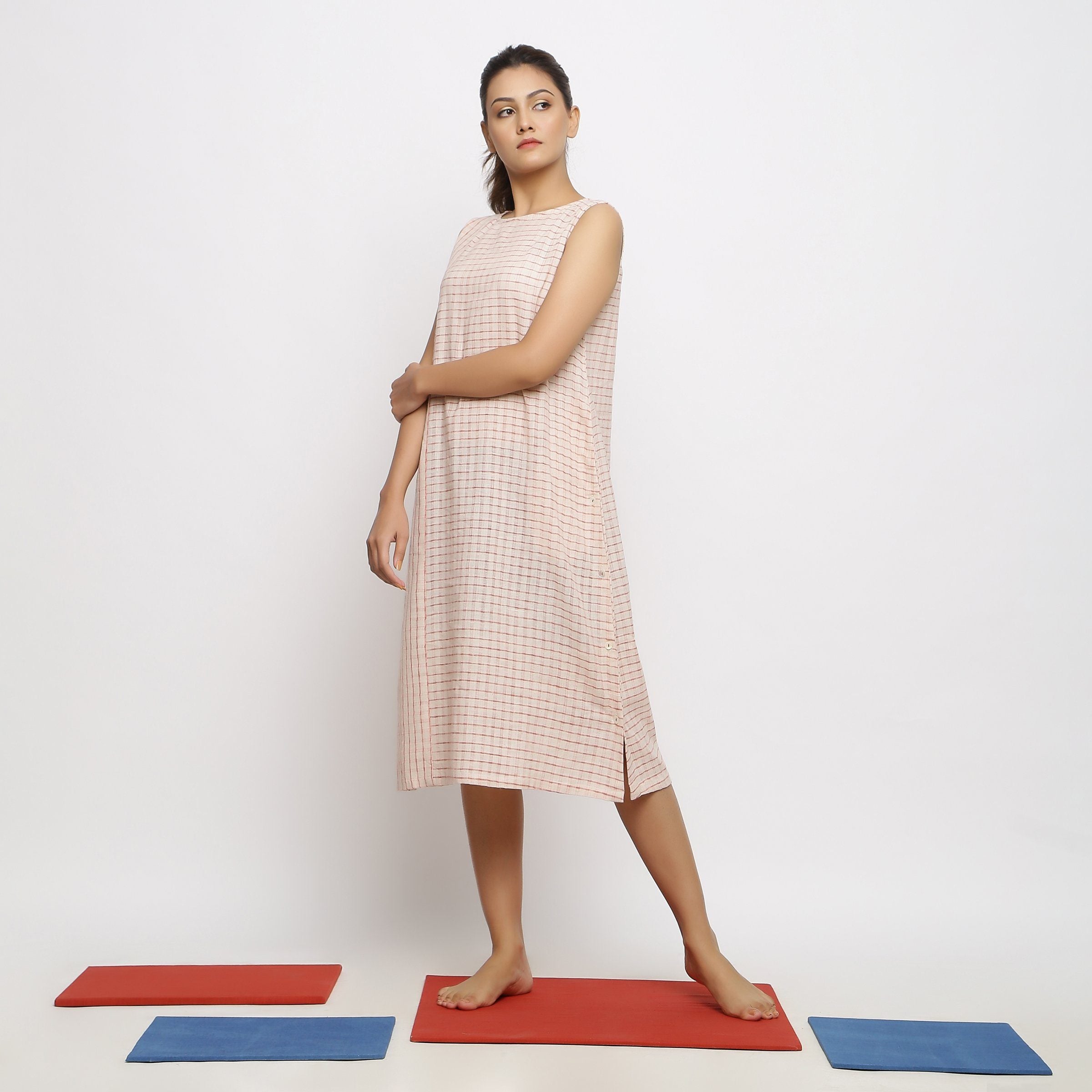 Left View of a Model wearing Vegetable Dyed Pink Paneled Dress