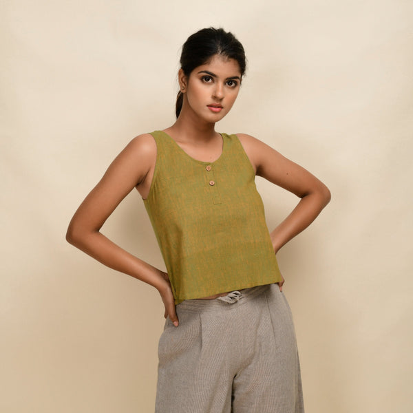 Front View of a Model wearing Gold Green 100% Cotton Sleeveless Short Top