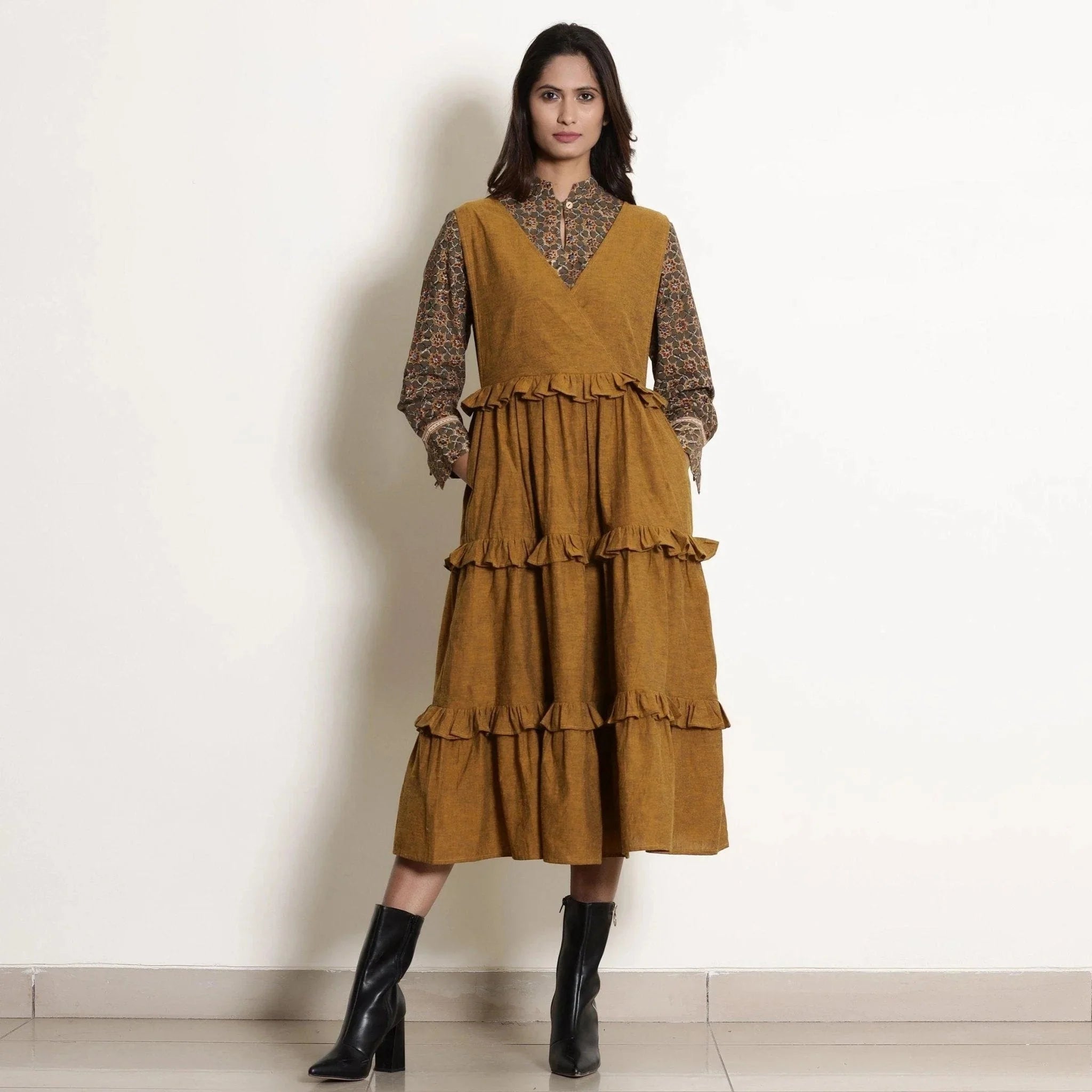 Front View of a Model wearing Golden Oak Tier Pinafore Frilled Dress