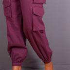 Front Detail of a Model wearing Grape Wine Warm Cotton Flannel Elasticated Cargo Jogger Pant