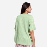 Back View of a Model wearing Green 100% Cotton High Low Tunic Top