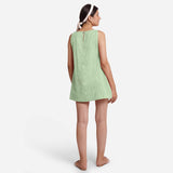 Back View of a Model wearing Green 100% Cotton Sleeveless Mini Tunic