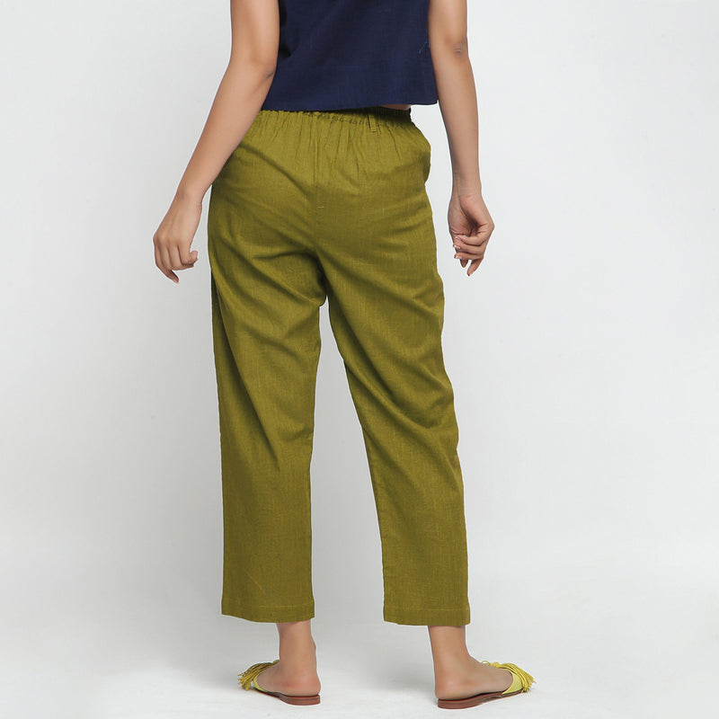 Back View of a Model wearing Green Ankle Length Mid-Rise Chinos