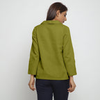 Back View of a Model wearing Green Bracelet Sleeve Straight Top