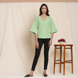 Front View of a Model wearing Green Comfy Straight Top