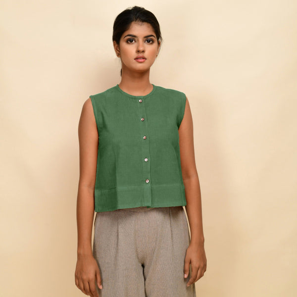 Front View of a Model wearing Green Corduroy Button-Down Short Top