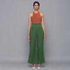 Front View of a Model wearing Green Corduroy Striped Bootcut Pant