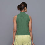 Back View of a Model wearing Green Cotton Corduroy High Neck Top