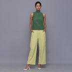 Front View of a Model wearing Green Cotton Corduroy High Neck Top