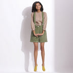 Front View of a Model wearing Green Cotton Corduroy Short Dungaree