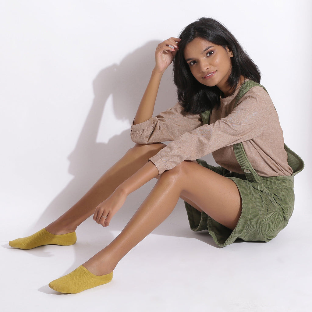 Left View of a Model wearing Green Cotton Corduroy Short Dungaree