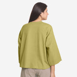 Back View of a Model wearing Green Cotton Flax A-Line Flared Top