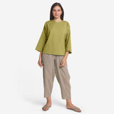 Front View of a Model wearing Green Cotton Flax A-Line Flared Top