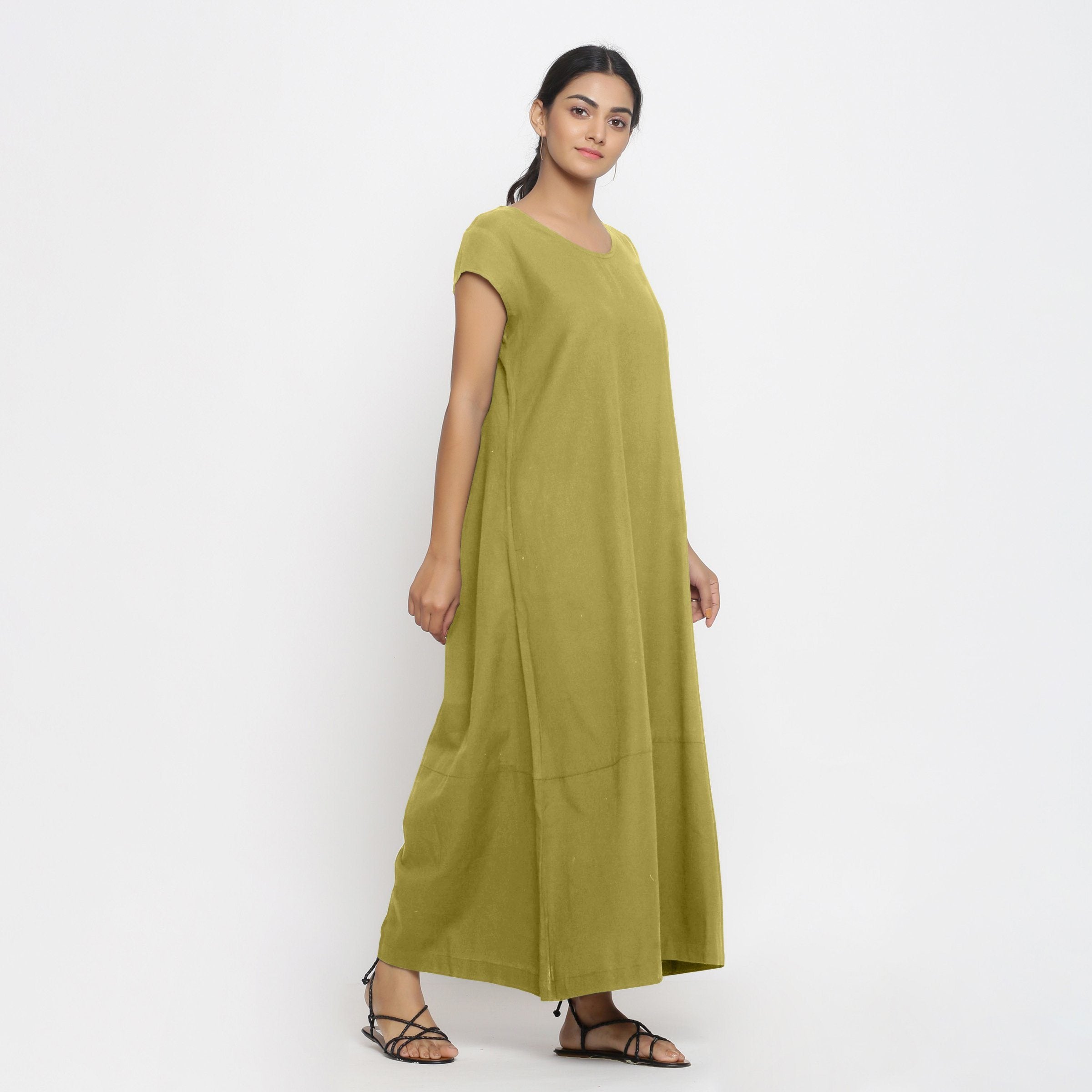 Right View of a Model wearing Green Cotton Flax A-Line Paneled Dress
