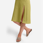 Front Detail of a Model wearing Green Cotton Flax Strappy Slit Dress