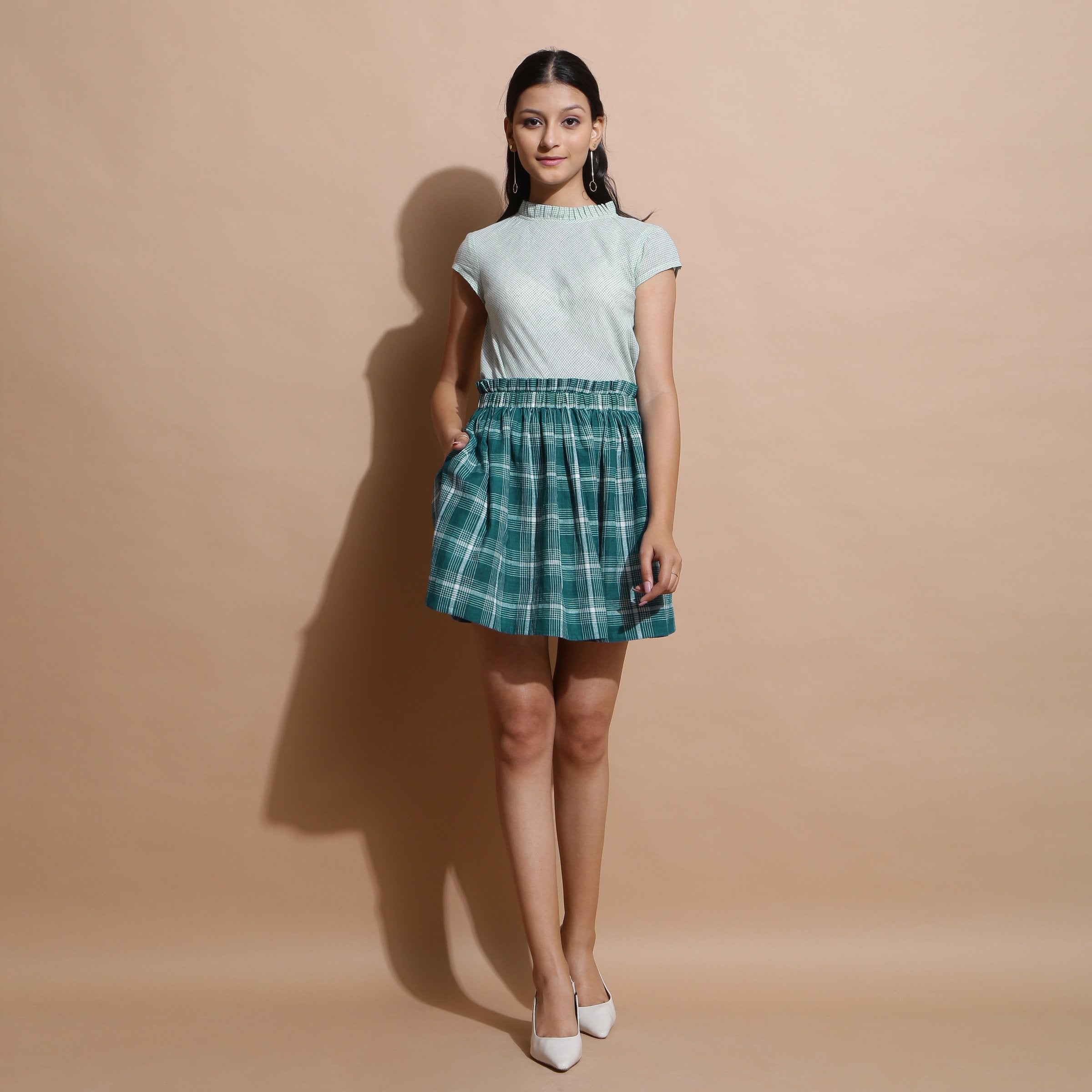 Front View of a Model wearing Green Handspun Paperbag Check Skirt