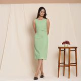 Front View of a Model wearing Green Knee Length Cotton Sheath Dress