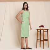 Right View of a Model wearing Green Knee Length Cotton Sheath Dress