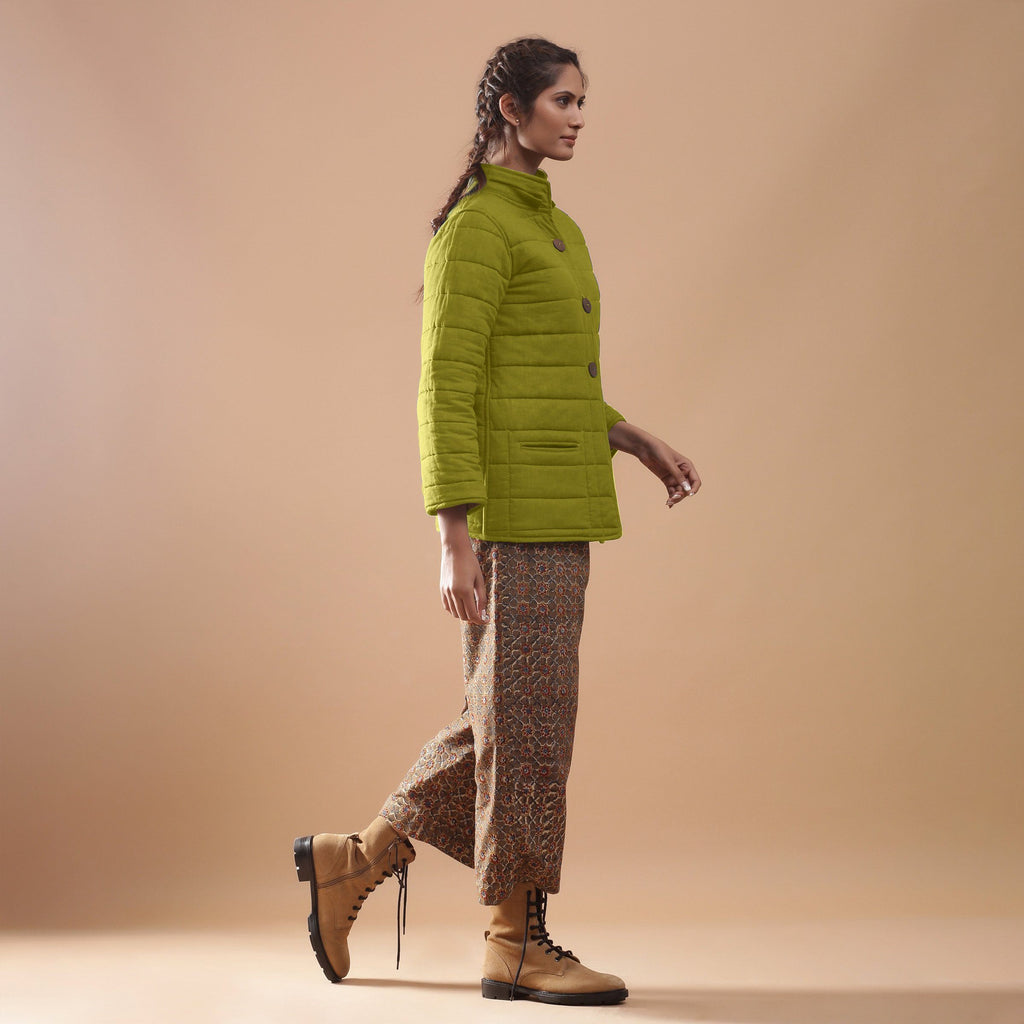 Right View of a Model wearing Green Reversible Detachable Hoodie Quilted Cotton Jacket