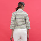 Back View of a Model wearing Green Reversible Block Print Cotton Short Shrug