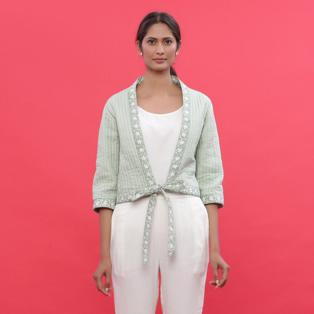 Front View of a Model wearing Green Reversible Block Print Cotton Short Shrug