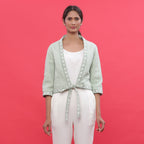 Front View of a Model wearing Green Reversible Block Print Cotton Short Shrug