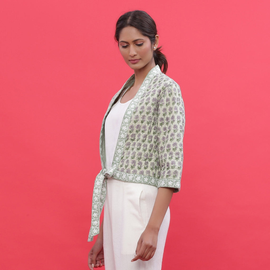 Left View of a Model wearing Green Reversible Block Print Cotton Short Shrug