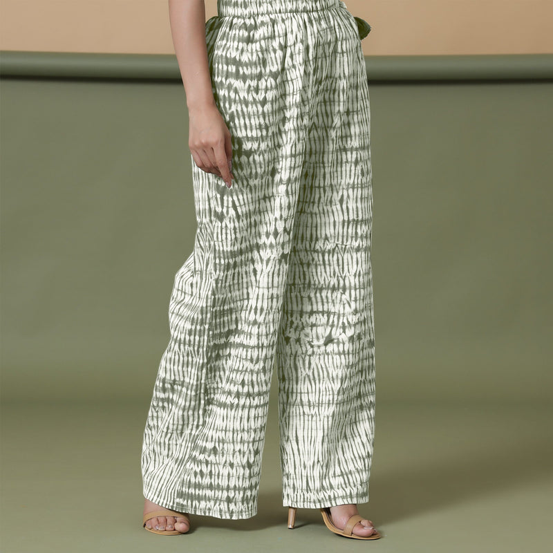 Right View of a Model wearing Green Shibori 100% Cotton Paperbag Pant