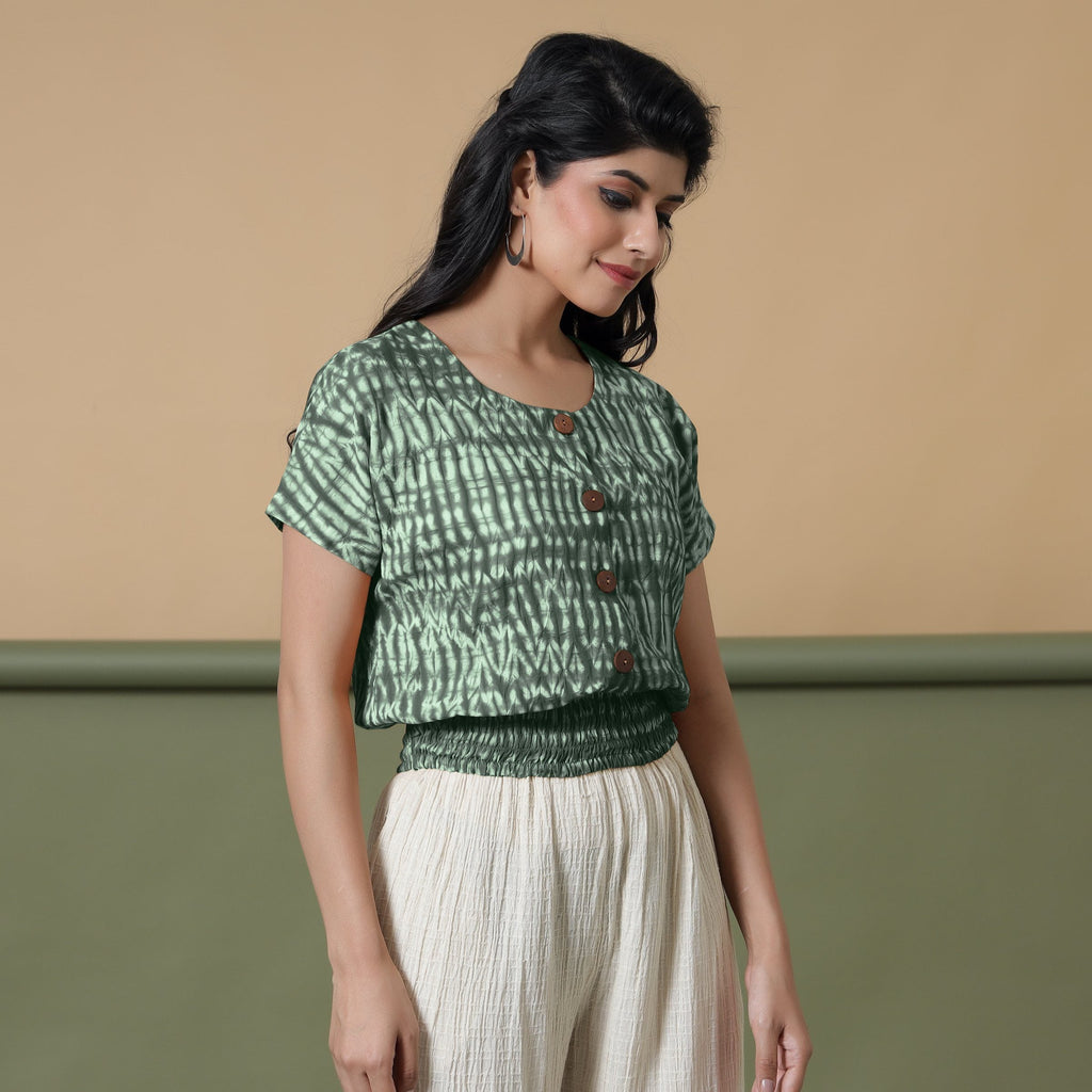 Right View of a Model wearing Green Shibori Tie-Dyed 100% Cotton Top