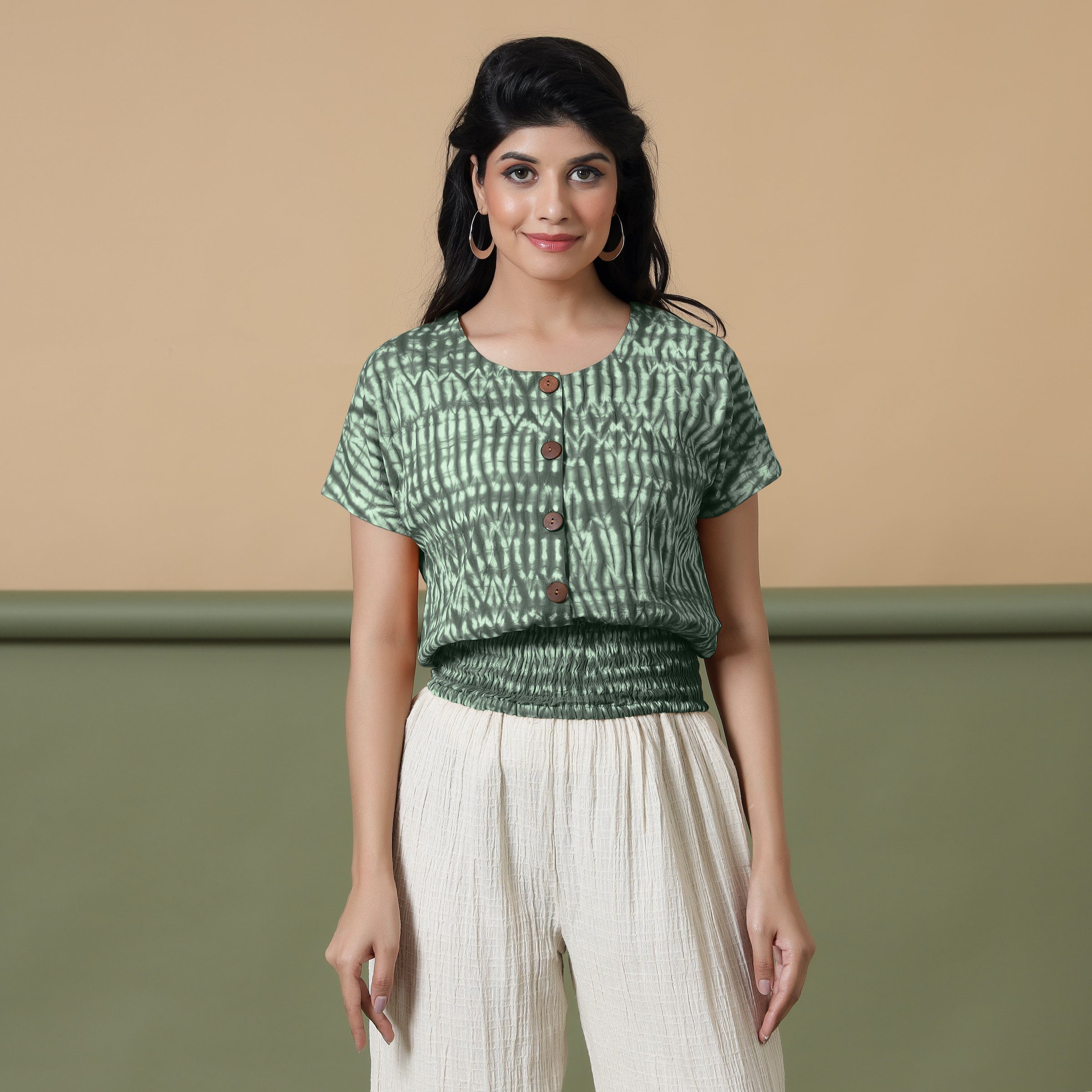 Front View of a Model wearing Green Shibori Tie-Dyed 100% Cotton Top