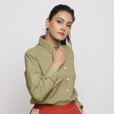 Right View of a Model wearing Green Vegetable Dyed 100% Cotton Button-Down Shirt