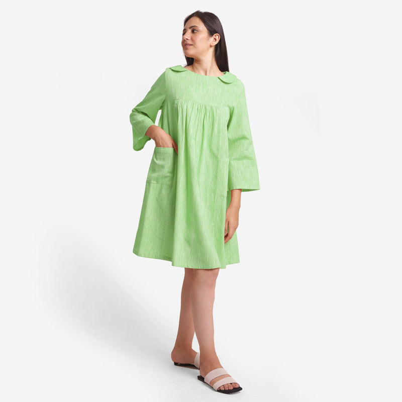Front View of a Model wearing Green Yarn Dyed Cotton Yoked Dress