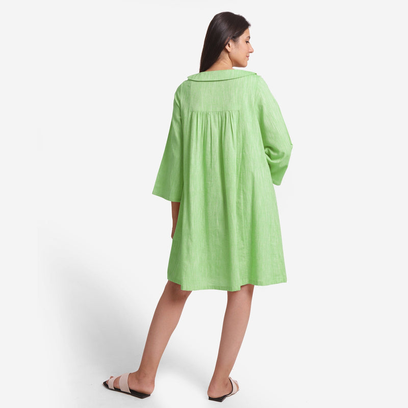Back View of a Model wearing Green Yarn Dyed Cotton Yoked Dress