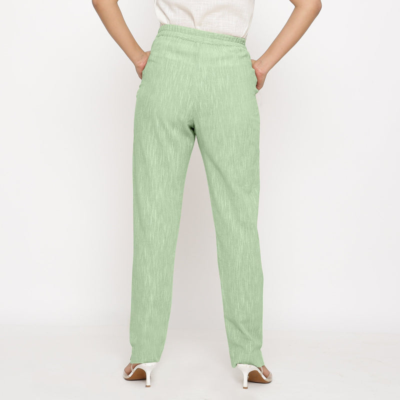 Back View of a Model wearing Green Yarn Dyed Mid Rise Tapered Pant