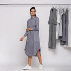Left View of a Model wearing Grey Button Down Flat Collar Dress