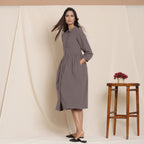 Left View of a Model wearing Grey Flannel Peter Pan Gathered Dress