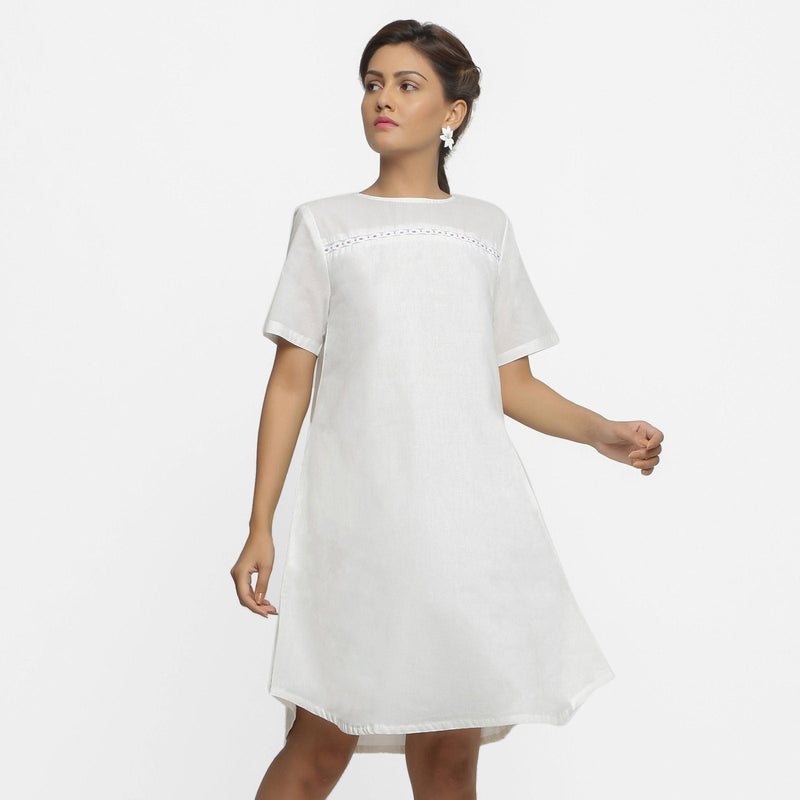 Front View of a Model wearing White Hand Beaded Cotton A-Line Dress