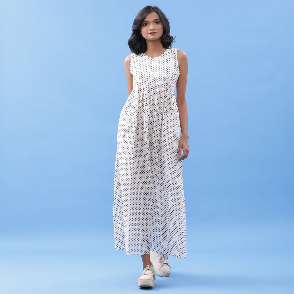 Front View of a Model wearing Hand Block Printed Minimal Pleated Maxi Dress