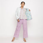 Front View of a Model wearing Hand-Block Printed Reversible Quilted Cotton Jacket