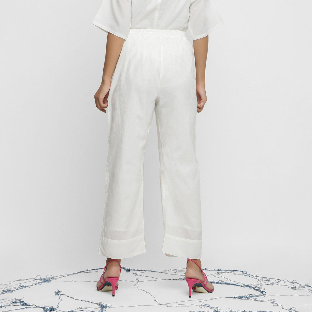 Back View of a Model wearing Off-White Banded Hem Straight Pant