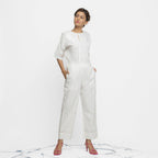 Front View of a Model wearing Off-White Banded Hem Straight Pant