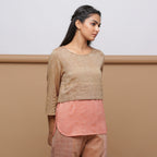 Right View of a Model wearing Handspun Beige Yoked Round Hem Top