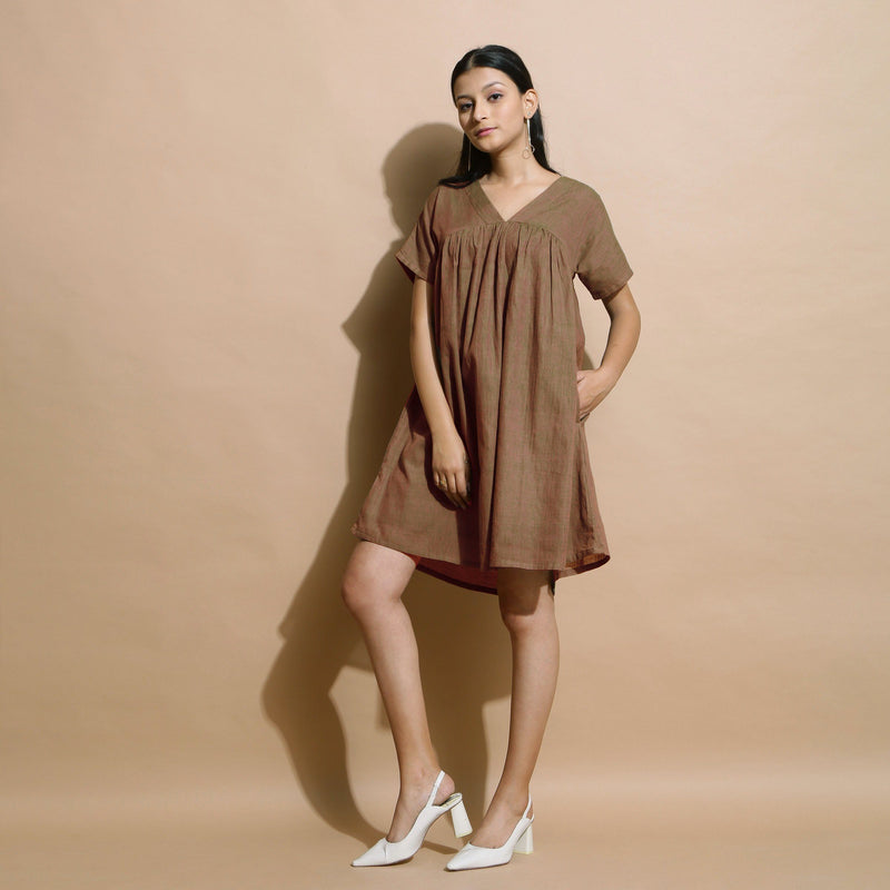 Front View of a Model wearing Handspun Brown Drop Shoulder Yoke Dress