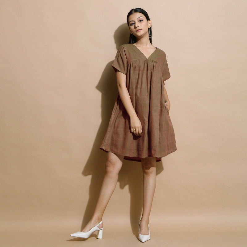 Front View of a Model wearing Handspun Brown Drop Shoulder Yoke Dress