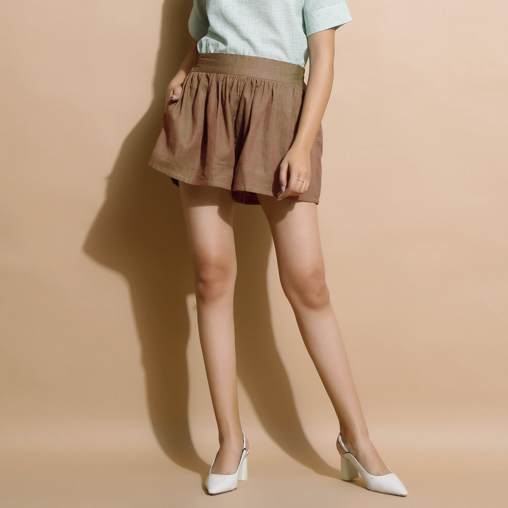 Front View of a Model wearing Handspun Brown Flared Shorts