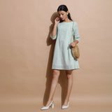 Front View of a Model wearing Light Green Handspun Cotton Muslin A-Line Short Dress