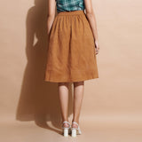 Back View of a Model wearing Handspun Cotton Muslin Flared Skirt